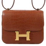 HERMèS Matte Alligator Constance Mini 19 shoulder bag in Gold with Gold hardware