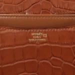 HERMèS Matte Alligator Constance Mini 19 shoulder bag in Gold with Gold hardware